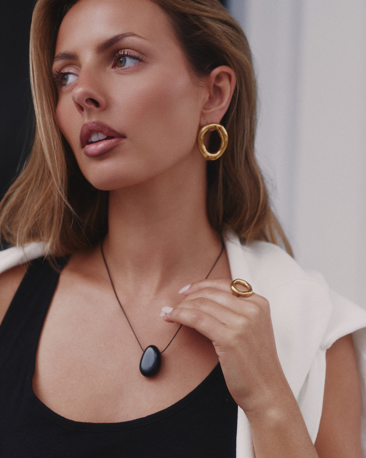 Layered gold necklaces